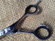 Barber Scissor with Micro Serrated edge.